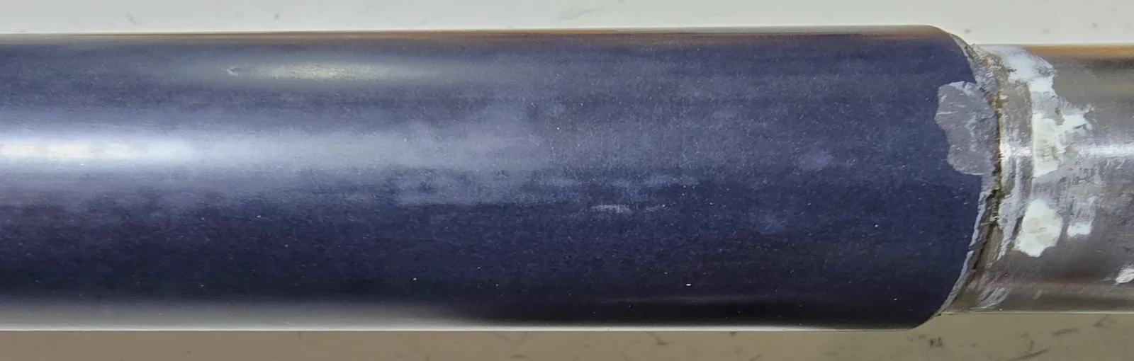 Restored production contact surface on a carbon-fiber smoothing bar